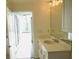 Modern bathroom with a quartz vanity and mirror at 155 S Court Ave # 2310, Orlando, FL 32801