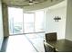 Living room with large windows and city views at 155 S Court Ave # 2310, Orlando, FL 32801