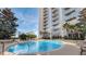 Inviting resort-style pool with surrounding lounge chairs at 155 S Court Ave # 2310, Orlando, FL 32801