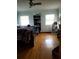 Second bedroom with hardwood floors and plenty of natural light at 1050 S Main Ave, Groveland, FL 34736