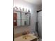 Clean bathroom with a new vanity and updated fixtures at 1050 S Main Ave, Groveland, FL 34736