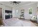 Spacious bedroom with built-in kitchenette and ample natural light at 3429 Boggy Creek Rd, Kissimmee, FL 34744