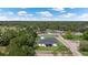 Aerial view showcasing a home's backyard and surroundings at 3429 Boggy Creek Rd, Kissimmee, FL 34744