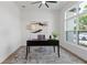 Home office features a large desk and window at 3429 Boggy Creek Rd, Kissimmee, FL 34744