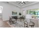 Living area features a comfy couch and large TV at 530 Boggy Creek Rd # 3429, Kissimmee, FL 34744