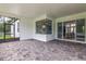 Covered patio with access to the dining and living areas at 3429 Boggy Creek Rd, Kissimmee, FL 34744