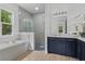 Elegant bathroom boasting double vanity and a large shower at 3429 Boggy Creek Rd, Kissimmee, FL 34744