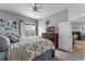 Bedroom with a king-size bed, and access to the living room at 618 Brunello Dr, Davenport, FL 33897