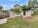 Backyard with patio, grass, and mature trees at 171 Ronnie Dr, Altamonte Springs, FL 32714