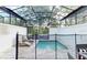 Enclosed private pool with patio furniture at 17317 Hidden Forest Dr, Clermont, FL 34714