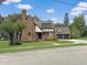 Charming brick house with a two-car garage at 1689 Lakeshore Dr, Eustis, FL 32726