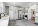 Updated kitchen featuring stainless steel appliances and a farmhouse sink at 1689 Lakeshore Dr, Eustis, FL 32726