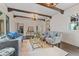 Living area with hardwood floors, comfortable seating and a neutral color scheme at 1689 Lakeshore Dr, Eustis, FL 32726