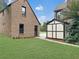 Brick garage and detached shed in backyard at 1689 Lakeshore Dr, Eustis, FL 32726
