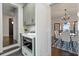 Kitchen boasts modern appliances and flows into a dining area with lake views at 1689 Lakeshore Dr, Eustis, FL 32726