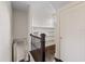 Upper hallway with built-in shelving and dark hardwood floors at 1689 Lakeshore Dr, Eustis, FL 32726