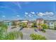 Aerial view of community with colorful homes and parking at 8016 Flip Flop Way, Kissimmee, FL 34747