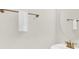Small bathroom with a sink, toilet, and oval mirror at 8016 Flip Flop Way, Kissimmee, FL 34747