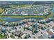 Aerial view showing home location near lake at 8016 Flip Flop Way, Kissimmee, FL 34747