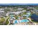 Aerial view of Margaritaville Resort with multiple pools at 8016 Flip Flop Way, Kissimmee, FL 34747