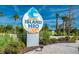 Island H2O Live! waterpark sign with palm trees at 8016 Flip Flop Way, Kissimmee, FL 34747