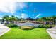 Margaritaville Resort entrance with landscaping and flags at 8016 Flip Flop Way, Kissimmee, FL 34747