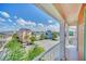 Balcony view of colorful townhomes and parking lot at 8016 Flip Flop Way, Kissimmee, FL 34747