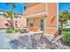 Relaxing patio with table and chairs, perfect for outdoor dining at 8016 Flip Flop Way, Kissimmee, FL 34747