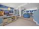 Open living area with high ceilings, stylish furniture and a view to the dining room at 9 Stone Gate N, Longwood, FL 32779