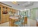 Bright kitchen with an island and breakfast nook at 9 Stone Gate N, Longwood, FL 32779