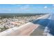 Aerial view of beachfront property and neighborhood at 3801 S Atlantic Ave # 321, New Smyrna Beach, FL 32169