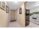 Entryway with tile floors, leading to kitchen and living areas at 3801 S Atlantic Ave # 321, New Smyrna Beach, FL 32169