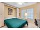 Bedroom with built-in murphy bed and desk at 3801 S Atlantic Ave # 321, New Smyrna Beach, FL 32169