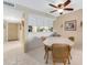 Kitchen with white cabinets and a breakfast bar at 3801 S Atlantic Ave # 321, New Smyrna Beach, FL 32169