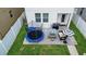 Backyard patio with trampoline and seating area at 11109 Folklore St, Winter Garden, FL 34787
