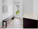 Laundry room with washer, dryer, and bench at 11109 Folklore St, Winter Garden, FL 34787