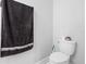 Simple and functional bathroom with toilet and towel at 11109 Folklore St, Winter Garden, FL 34787
