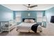 Spacious bedroom with a crib and plenty of natural light at 11109 Folklore St, Winter Garden, FL 34787