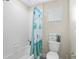 Small bathroom with shower and toilet at 11109 Folklore St, Winter Garden, FL 34787