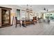Farmhouse style dining area with wooden table and bench at 7706 Graben St, Kissimmee, FL 34747