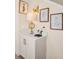 Entryway with built-in cabinets and stylish wall art at 7706 Graben St, Kissimmee, FL 34747