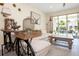 Living room featuring a unique bicycle-style console table at 7706 Graben St, Kissimmee, FL 34747
