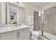 Bathroom with a walk-in shower and white vanity at 7706 Graben St, Kissimmee, FL 34747