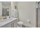 Clean bathroom with shower, toilet and vanity at 7706 Graben St, Kissimmee, FL 34747