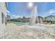 Spray fountain near a luxurious pool and spa at 7706 Graben St, Kissimmee, FL 34747