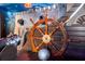 Pirate-themed bedroom with ship's wheel and barrel detail at 7706 Graben St, Kissimmee, FL 34747