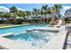 Spacious hot tub adjacent to the refreshing pool at 7706 Graben St, Kissimmee, FL 34747