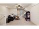 Game room with a couch, TV, and arcade game at 7143 Oakmoss Loop, Davenport, FL 33837