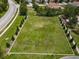 Aerial view of a vacant lot in a residential community at 7143 Oakmoss Loop, Davenport, FL 33837