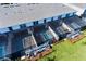 Aerial view of townhouses with private screened pools at 7143 Oakmoss Loop, Davenport, FL 33837